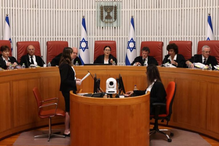 Israel’s top court strikes down key part of judicial overhaul, reigniting divisions as war rages