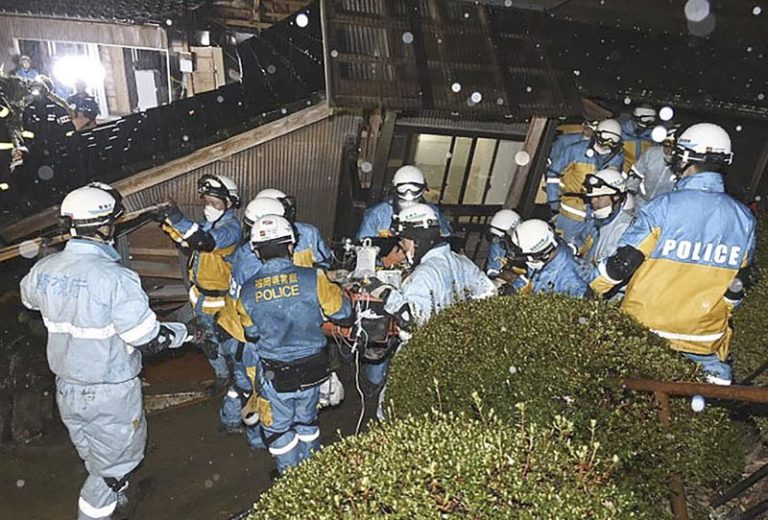 Woman in her 90s pulled alive from rubble five days after Japan earthquake