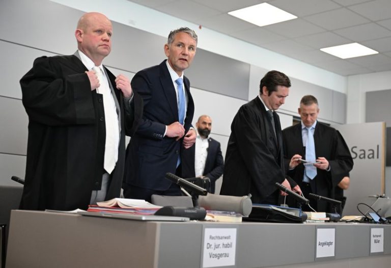 Far-right German politician on trial accused of using banned Nazi slogans