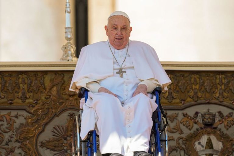 Pope Francis makes surprise public appearance after leaving hospital two weeks ago